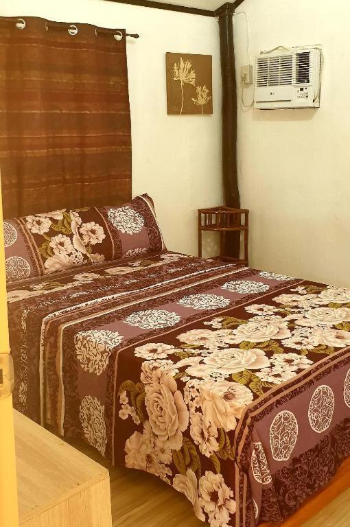ألامينوس Traditional Filipino Transient House And Huts Near 100 Islands Wharf المظهر الخارجي الصورة