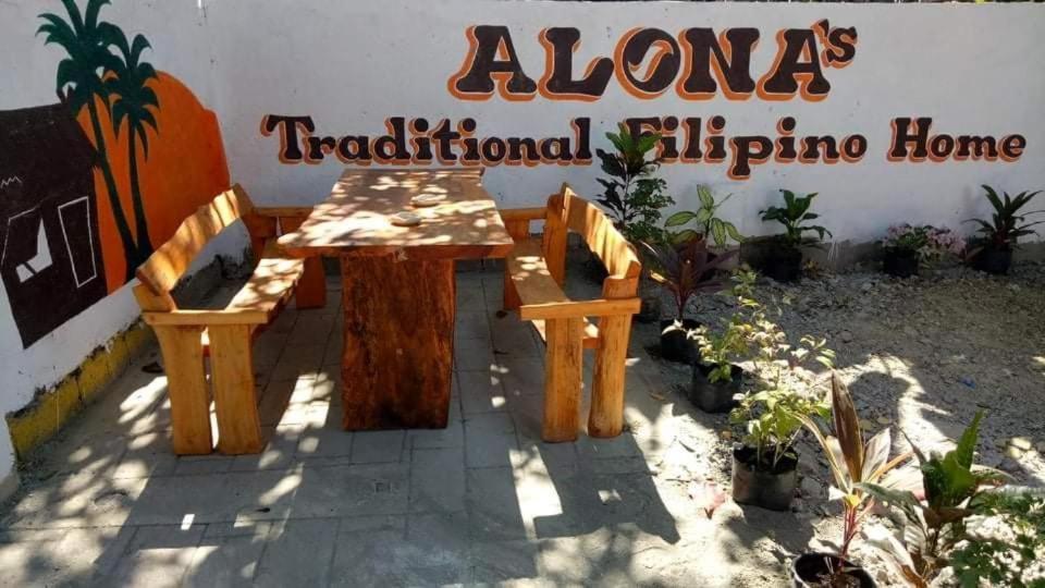 ألامينوس Traditional Filipino Transient House And Huts Near 100 Islands Wharf المظهر الخارجي الصورة