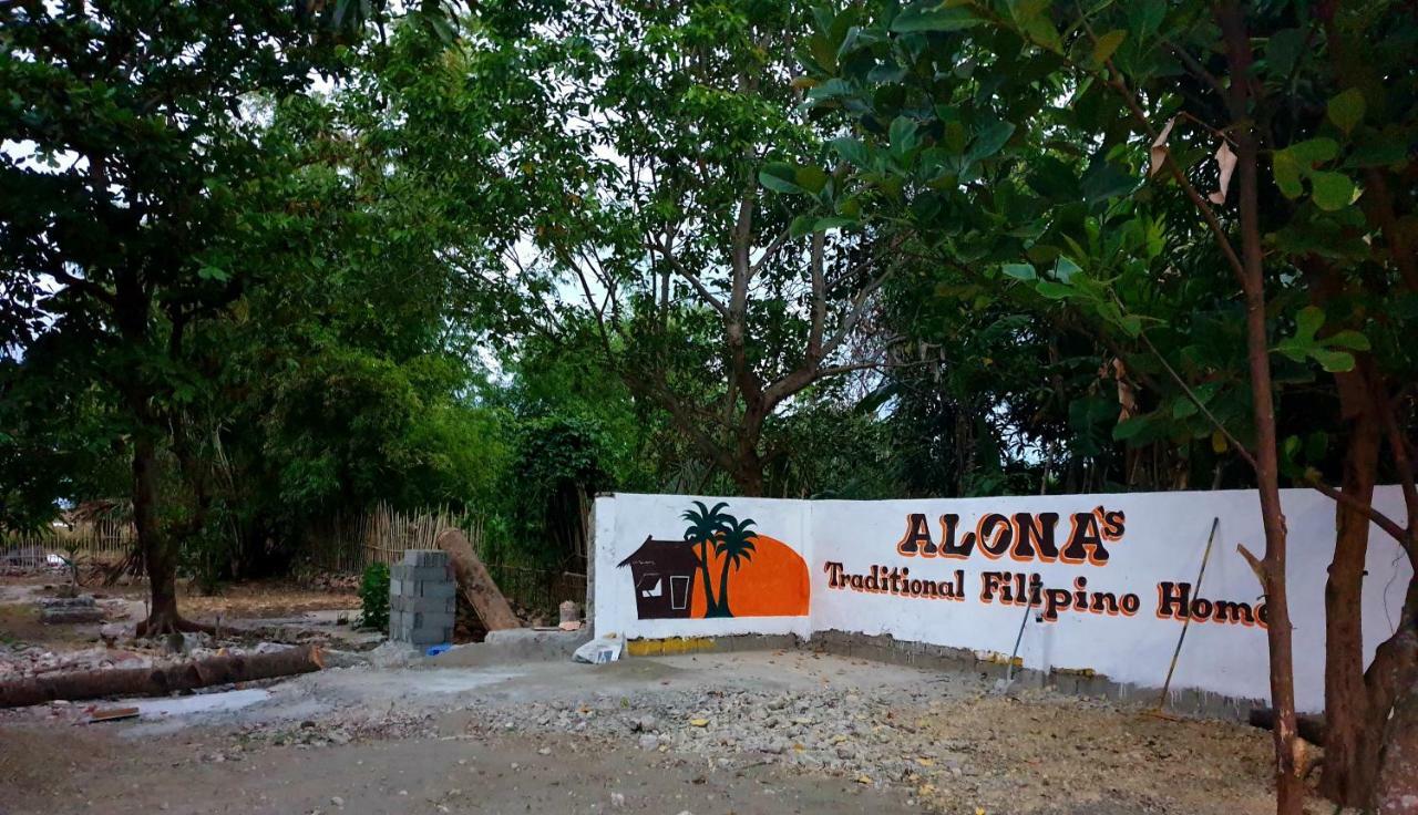 ألامينوس Traditional Filipino Transient House And Huts Near 100 Islands Wharf المظهر الخارجي الصورة