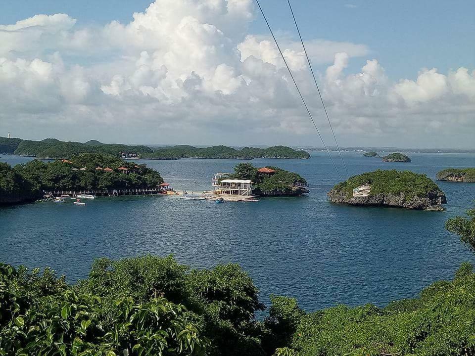 ألامينوس Traditional Filipino Transient House And Huts Near 100 Islands Wharf المظهر الخارجي الصورة